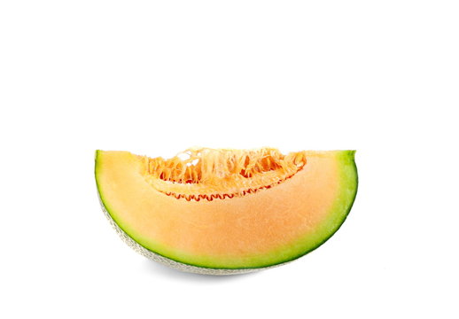 Slices orange Melon fruit isolated on the white background.