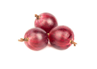 Three red gooseberries