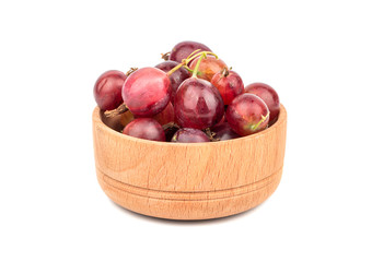 Red gooseberries in bowl