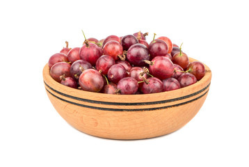 Red gooseberries in bowl