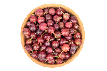 Red gooseberries in bowl