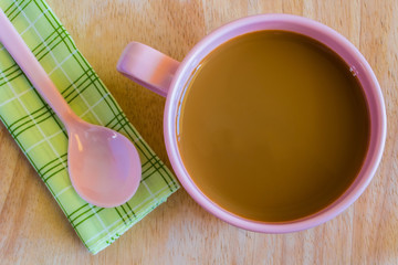 Hot coffee in pink cup