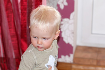 Fototapeta premium Blonde baby boy in home