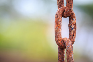 Old and rusty chain on blur background