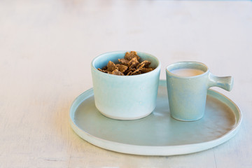Whole grain cereals and milk for breakfast