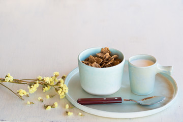 Whole grain cereals and milk for breakfast
