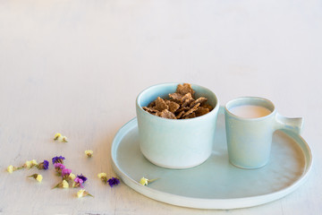 Whole grain cereals and milk for breakfast