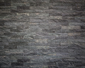 Pattern of black slate wall texture for background