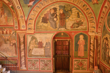 Fototapeta na wymiar Vestments and paintings in a monastery in the valley of the Bene