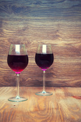 Wine glass on a wooden background
