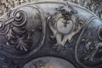 flourishes carved in stone