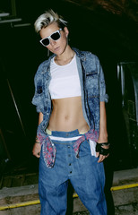 Fashion Denim. Outdoors. Stylish Blonde.