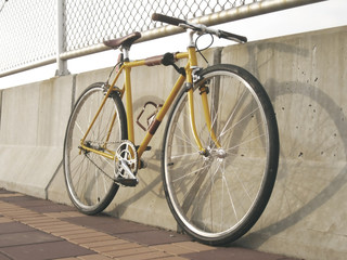 Fototapeta na wymiar Yellow bicycle , vintage japanese style