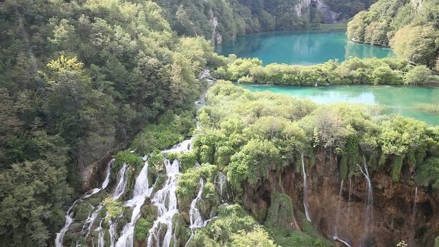 Waterfall in green forest. Plitvice lake, Croatia