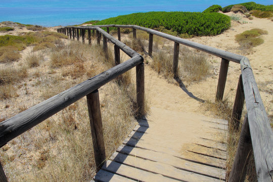 Beautiful sea and sandy dunes of Salento, Apulia, Italy