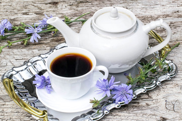 Drink from chicory and blooming chicory