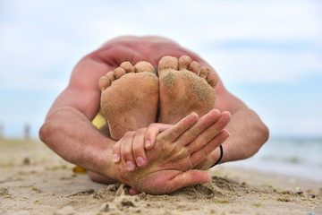 Young man practicing yoga