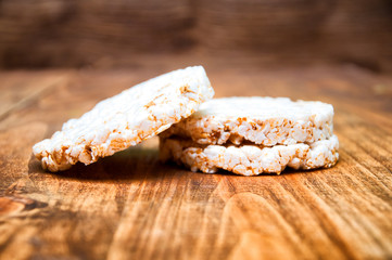 Rice waffles on wooden table