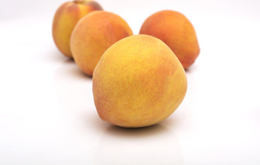 Ripe peach fruit isolated on white background