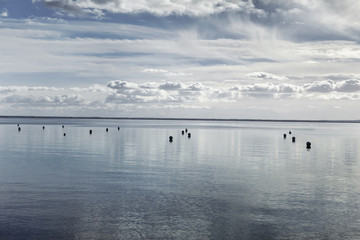 Naklejka premium Sea and cloudy sky