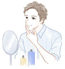 鏡をのぞく男性