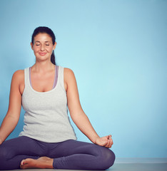 Young Yoga Woman In Lotus Position