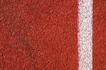 Red running track texture.