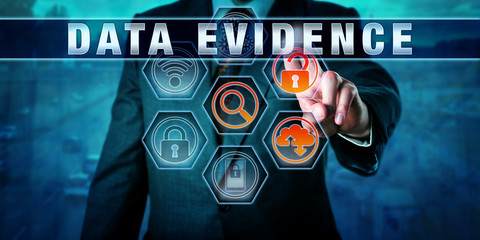 Forensic Examiner Pressing DATA EVIDENCE