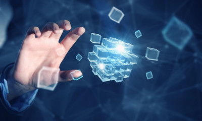 Cube in female hand . Mixed media