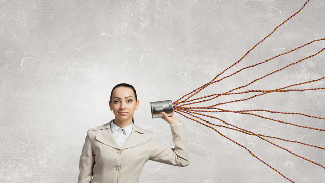 Woman using deaf phone . Mixed media