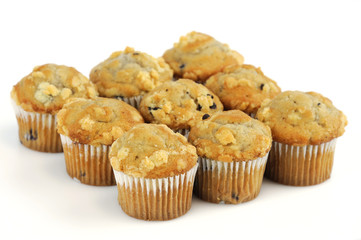 fresh muffins isolated on white background