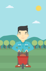 Man with plant and wheelbarrow.