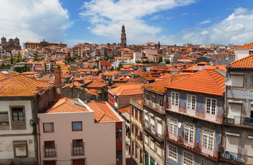 Fototapeta na wymiar Colorful facades and roofs, historic centre view of Porto, Portugal.