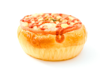 side view bread with BBQ pork on top on a white background