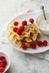 stack breakfast waffles with berry and yoghurt