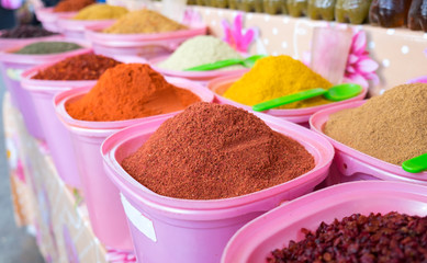 Colorful spices far sale at farmers market. Georgia
