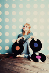 Young girl with vinyl records