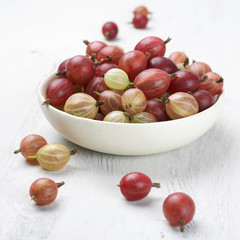 Gooseberries in white bowl