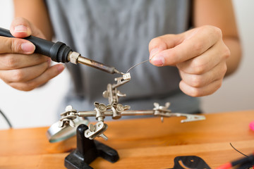 Man welding the wire