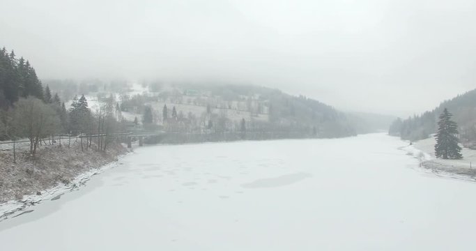 Aerial: Storage lake of Spindler Mill, Czech Republic in winter
