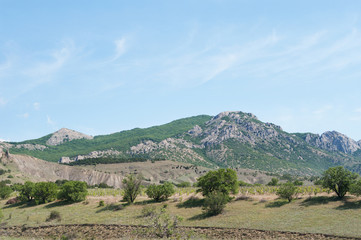 Fototapeta na wymiar mountain range Echki-Dag, view from Sunny (Kozsky) valley, Crimea 