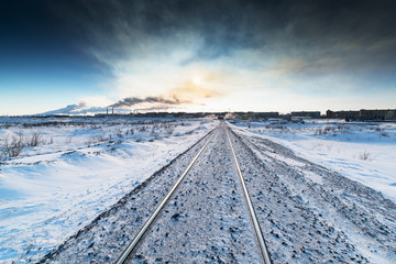 Winter railroad built on permafrost. - obrazy, fototapety, plakaty