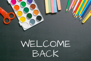 welcome back white chalk text