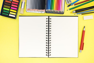 student desk background with notepad and stationary for writing