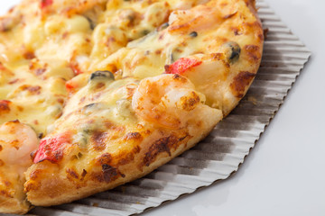 Hot piece of pizza with melted cheese