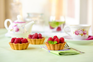 Fruit raspberry tart cakes on a table