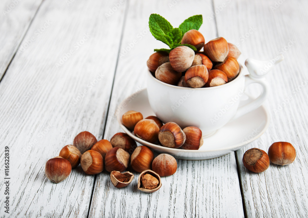 Sticker cup with hazelnuts