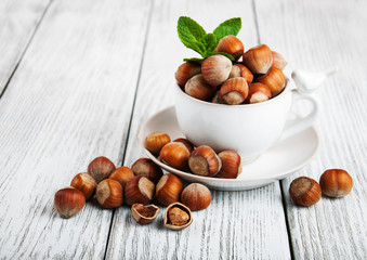 Cup with hazelnuts