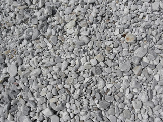 Texture of pebbles from a beach shore