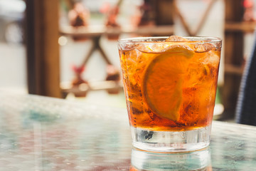Boulvardier coctail on glass table